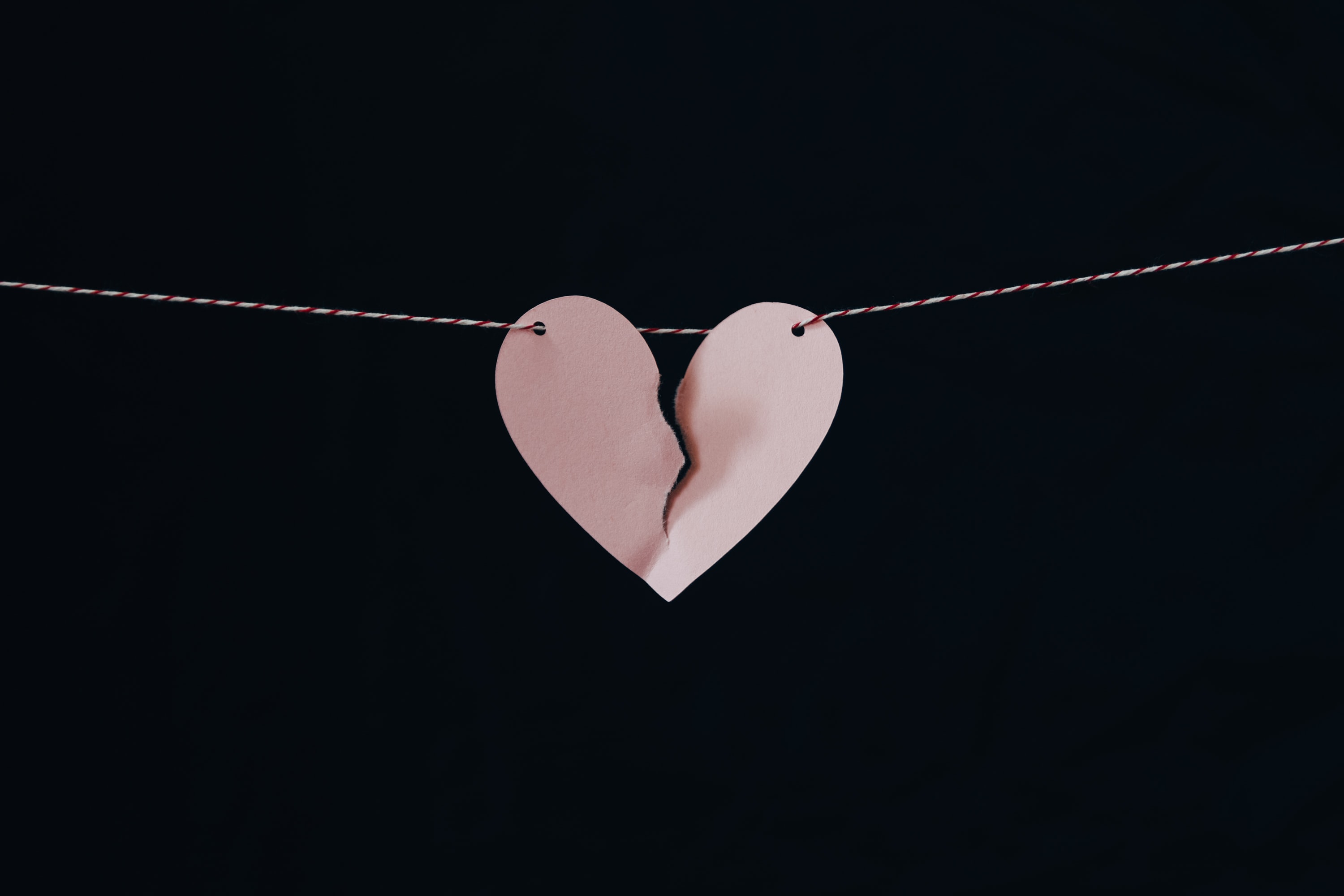 Broken heart on string